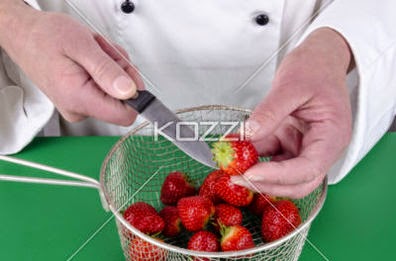 Female Chef Preparing Some Strawberries